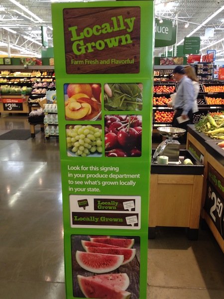 Signage for Locally Grown produce at Walmart